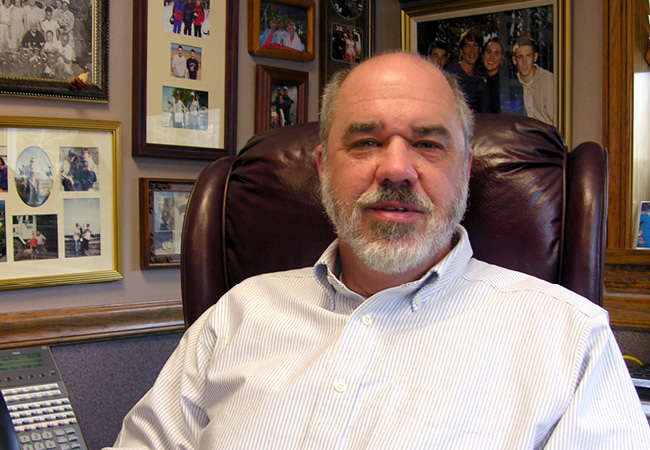 Headshot of Gary Arold in his office